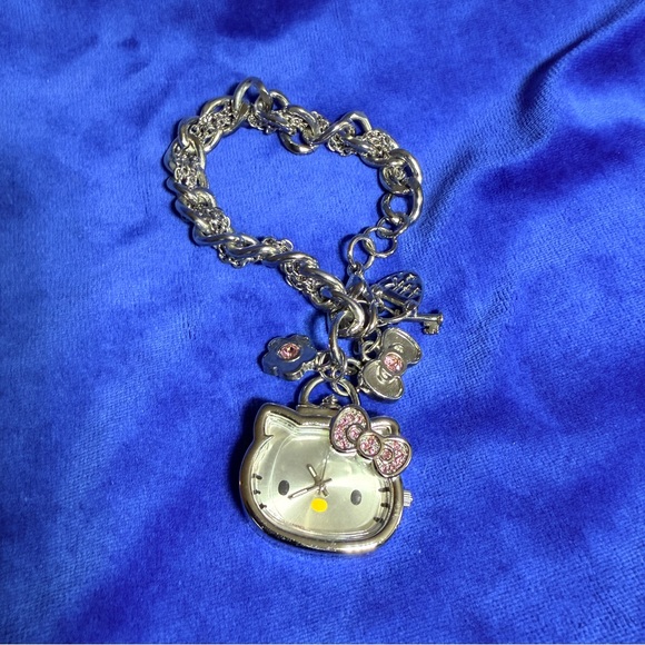 Hello Kitty Accessories - Hello Kitty Silver Charm Bracelet Watch with Pink Bow Accents